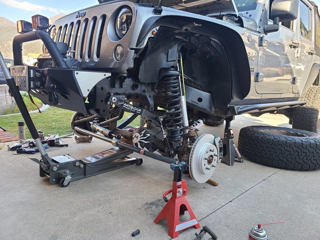 How To Jack Up A Jeep: Expert Tips for Safe Lifting