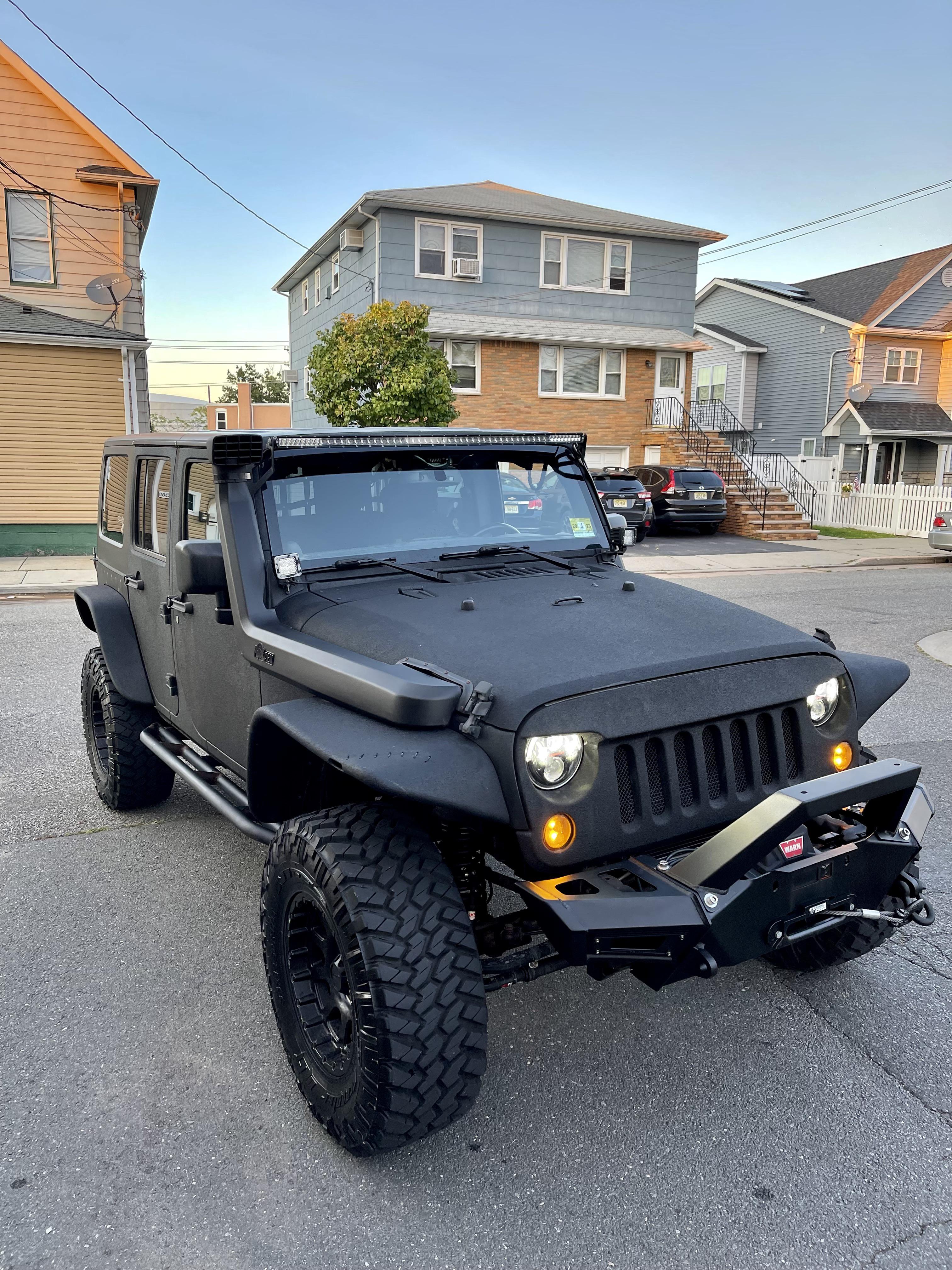 How Much Does A 2014 Jeep Wrangler Cost: Price Guide & Tips