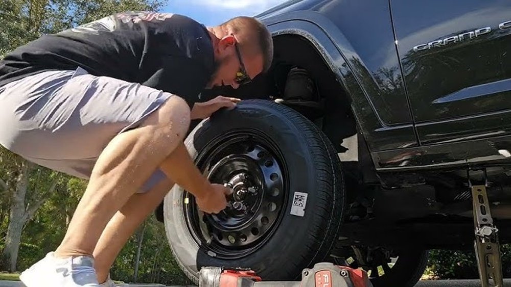 how to change a tire jeep grand cherokee