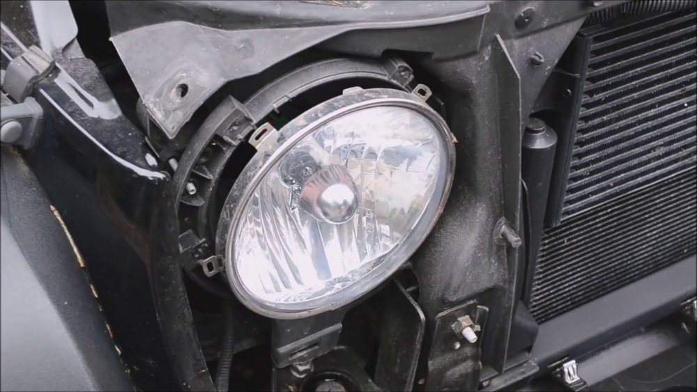 how to change jeep wrangler headlight bulb