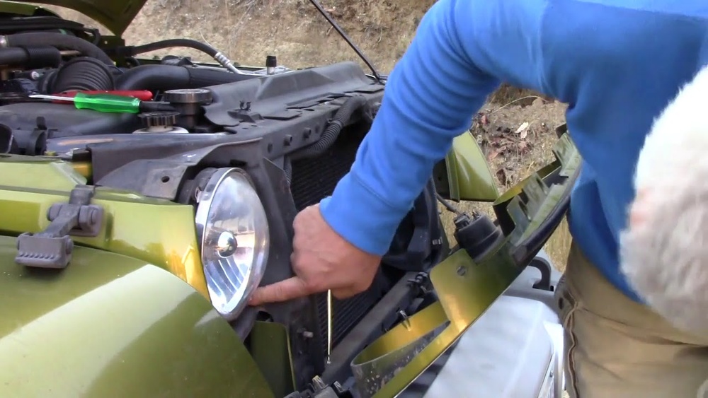 how to change the front lights on 2010 jeep wrangler