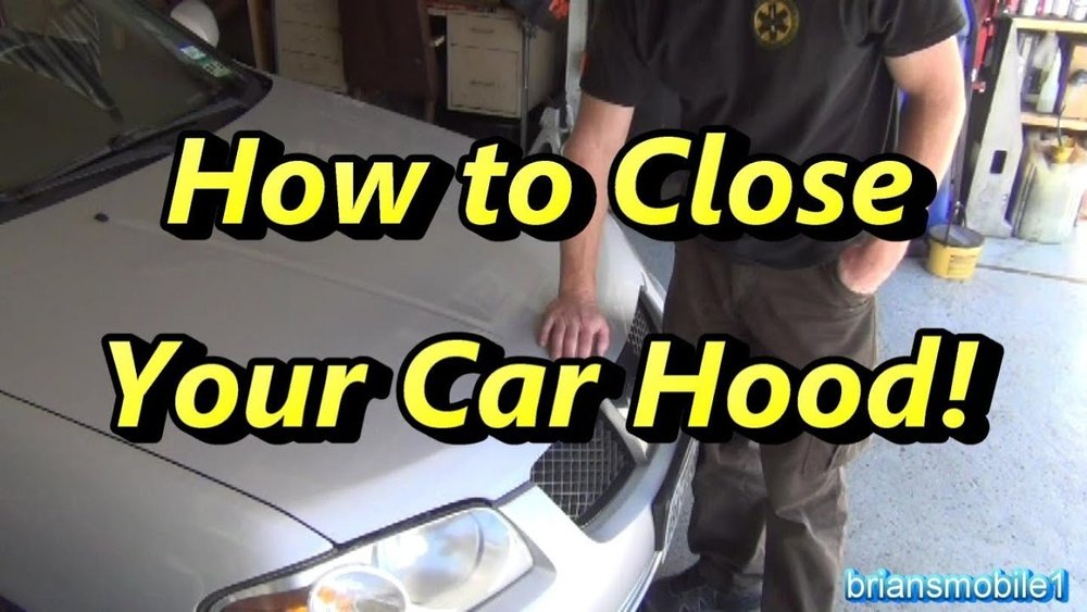 how to close hood on jeep grand cherokee