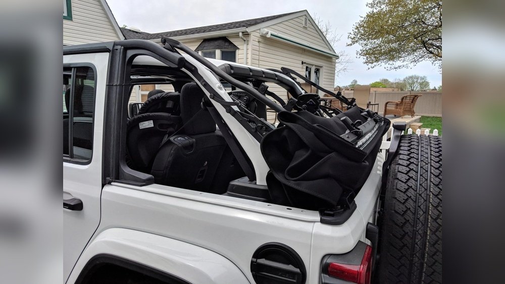 how to fold down a jeep soft top