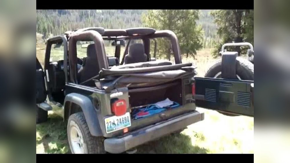 how to fold down jeep tj soft top