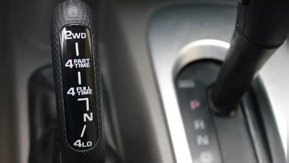 how to put a 2007 jeep liberty in 4 wheel drive