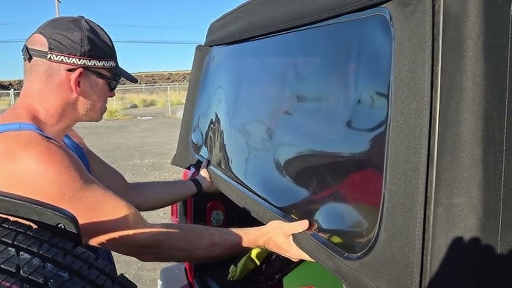 how to put soft top back on jeep