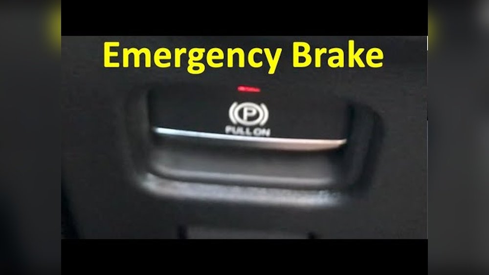 how to release parking brake on jeep grand cherokee 2024