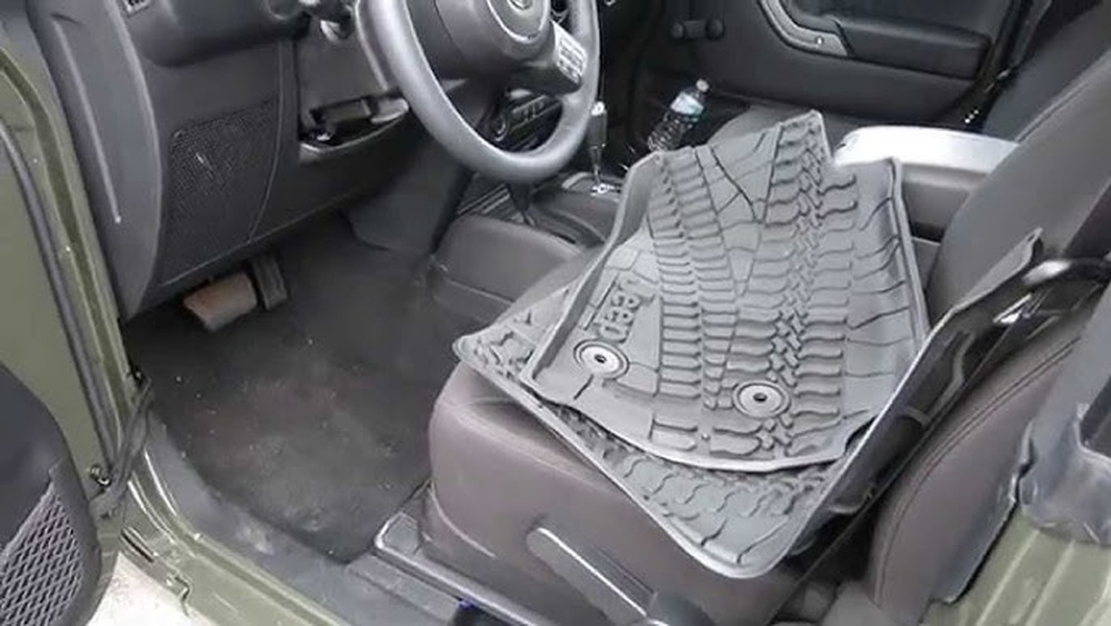 how to remove jeep floor mats
