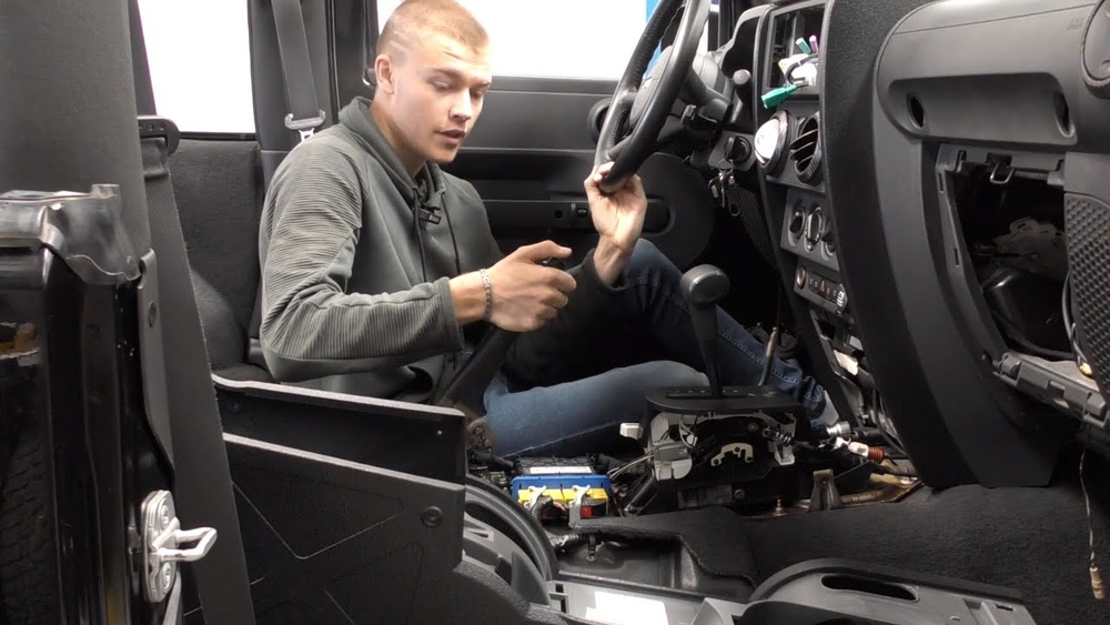 how to remove jeep jk center console