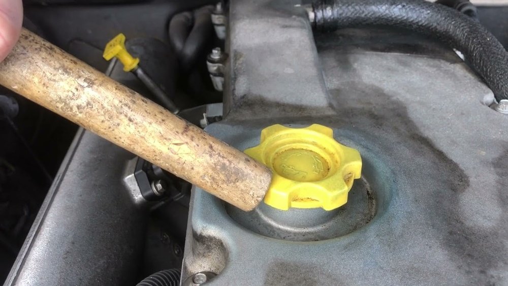 how to remove stuck oil cap
