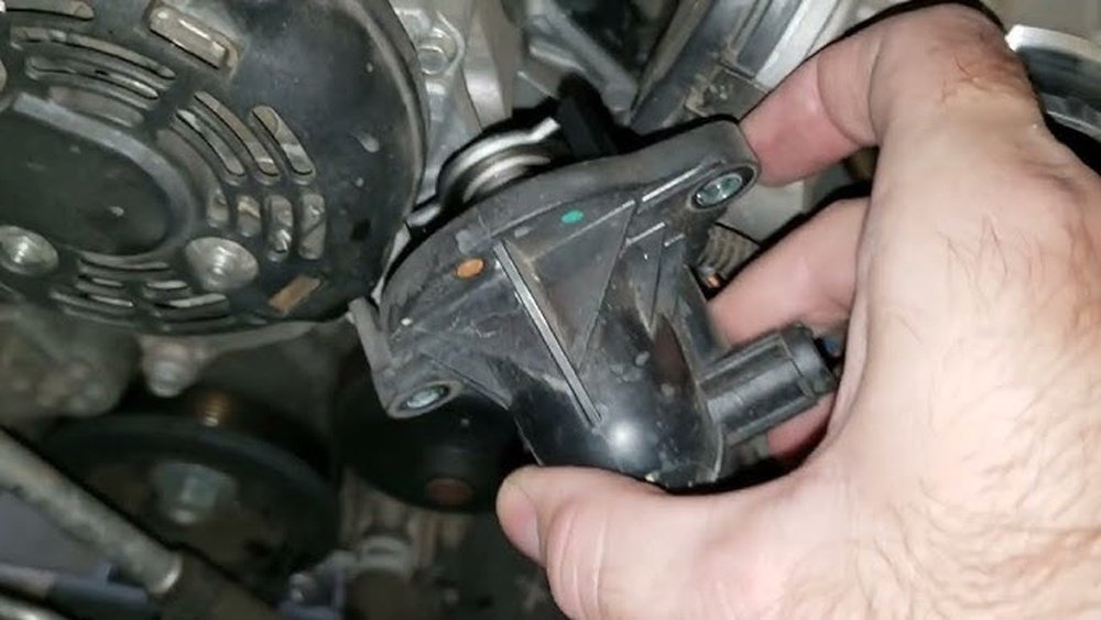 how to replace thermostat in 2016 jeep wrangler