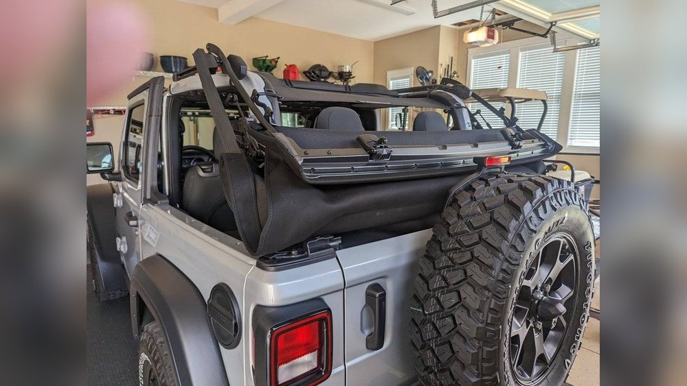 how to secure jeep soft top when down