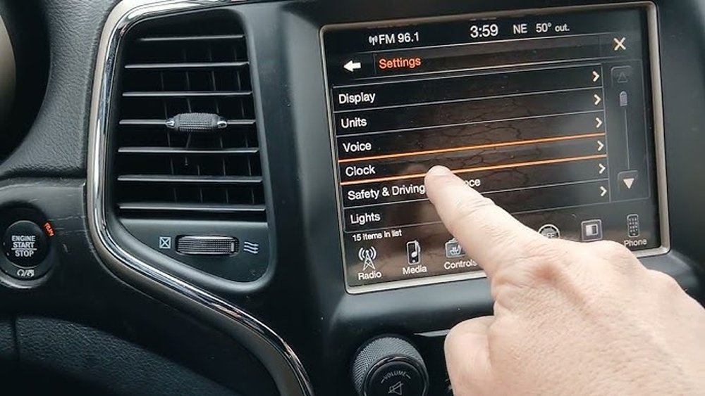 how to set clock on jeep grand cherokee