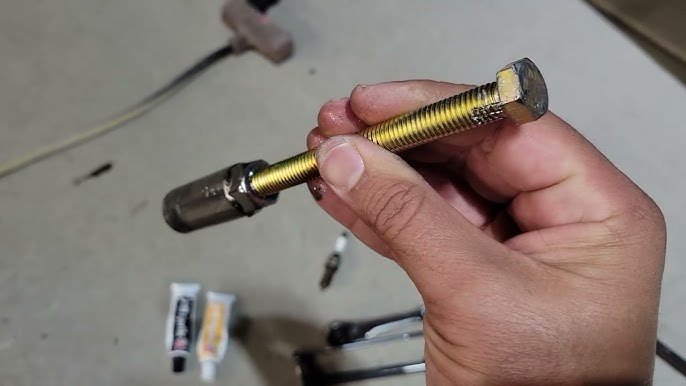 How To Remove A Frozen Spark Plug: Expert Tips That Work