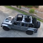 How Do I Take A Soft Top Off A Jeep Wrangler: Easy Guide