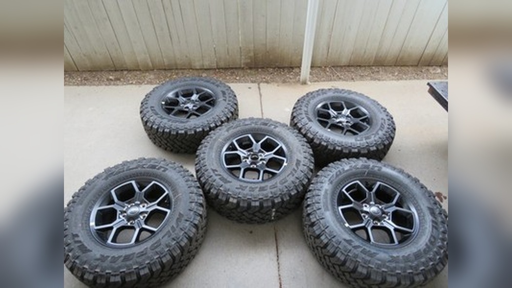 Set Of 5 33 Jeep Tires And Black Rims: Ultimate Off-Road Upgrade set of 5 33 jeep tires and black rims