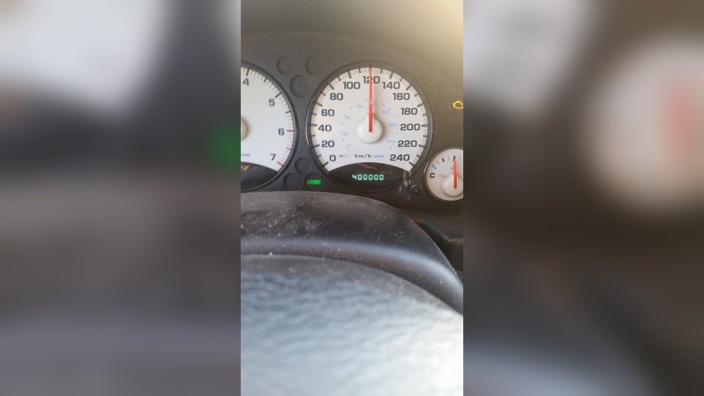 what does the engine light look like 2004 jeep liberty
