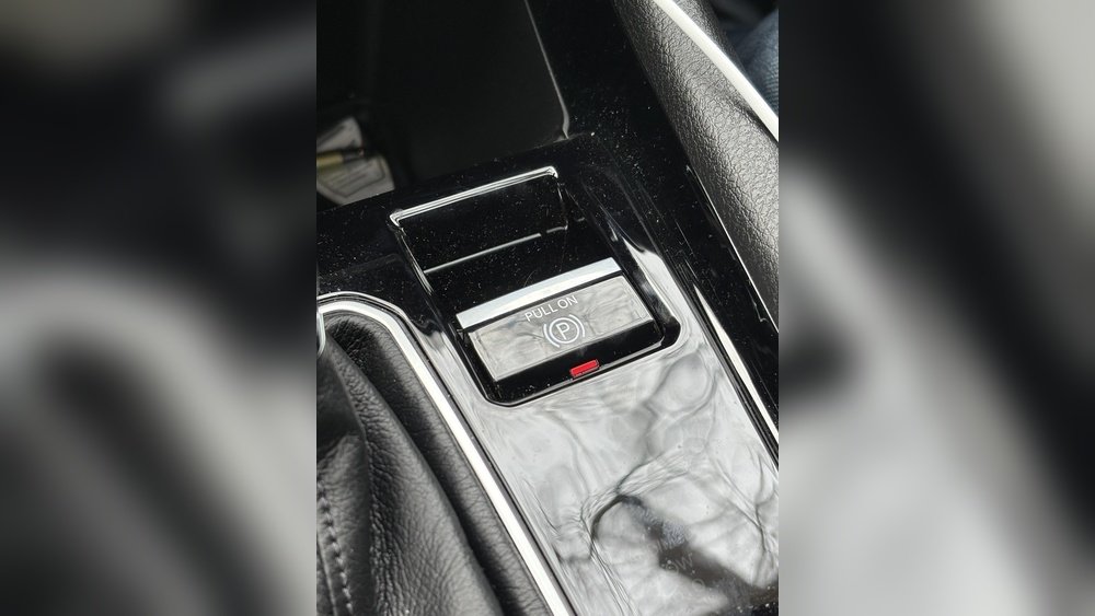 why does my parking brake automatically engage jeep compass